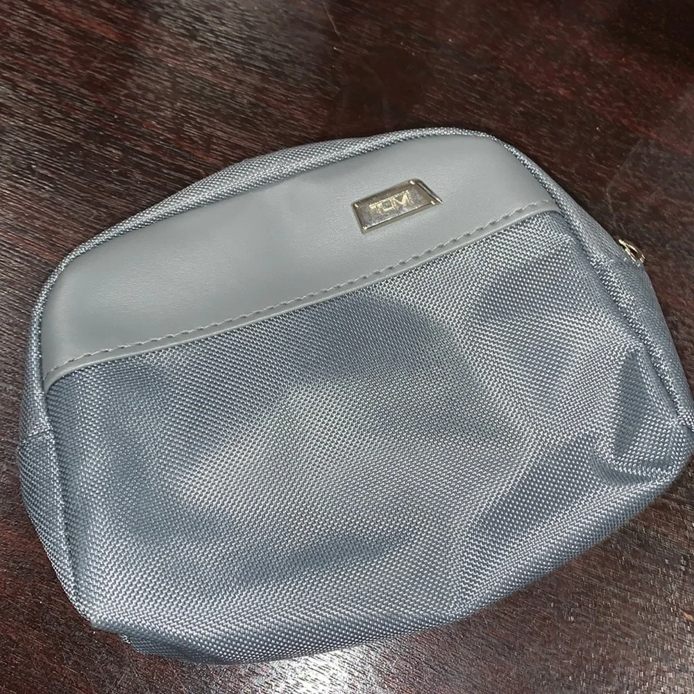 EUC TUMI gray toiletry bag